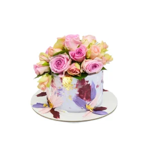 Elegant floral cake with pink and green roses, burgundy brushstrokes, gold leaf accents and painted base.