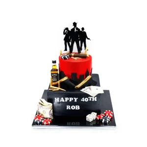 Two-tier mafia themed cake with red and black fondant, gangster silhouettes, edible cigars, bullets, poker chips, and whiskey bottle.