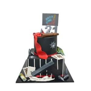 Gangster themed birthday cake with cigar, bullets, playing cards, money, gun, and “BADA BING!” topper.